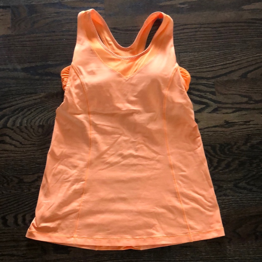 Neon orange top with built in sports bra and pads